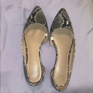 Snake print flats.